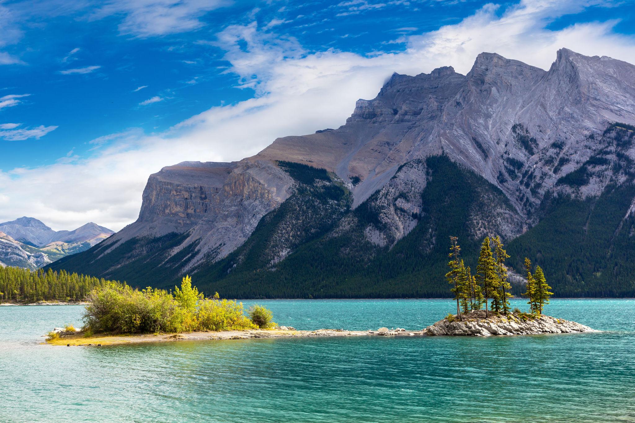 Lake Minnewanka surrounded by mountains in Banff
